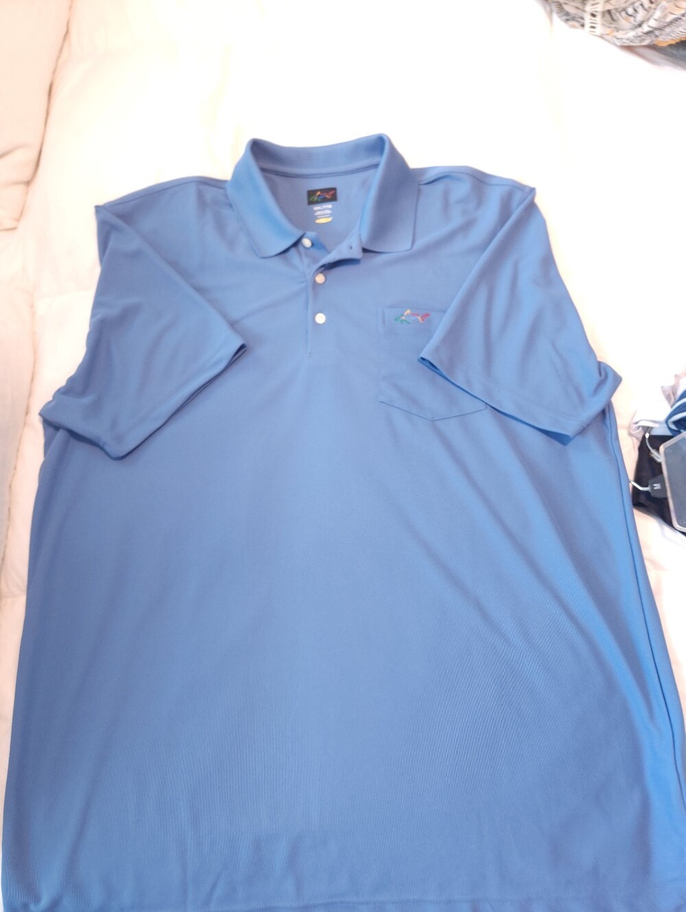 Greg Norman Play Dry Blue Short Sleeve Polo